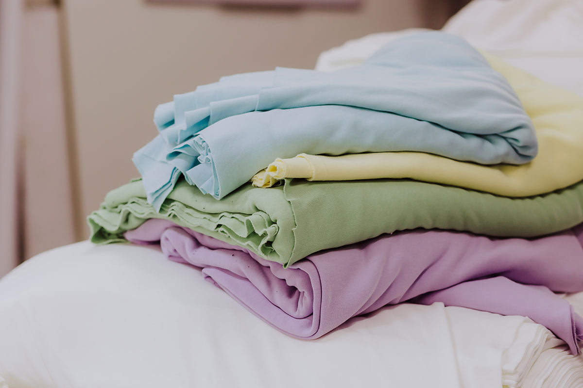 Stack of folded colorful peruvian organic pima cotton